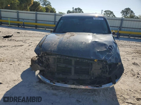 2018 Ram 1500 SLT z VIN 1C6RR6GT9JS104936, wystawiony jako Copart lot #52695115 z przebiegiem 74 496 mil mil oraz Szkody całkowita. Historia ofert i sprzedaży dostępna na DreamBid. Obrazek 5.