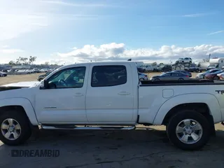 2015 Toyota Tacoma PreRunner with VIN 3TMKU4HN6FM044238, listed as a IAAI auction lot 41534623 with 196,490 mi miles and . Bid and sale history available at DreamBid. Image 14.