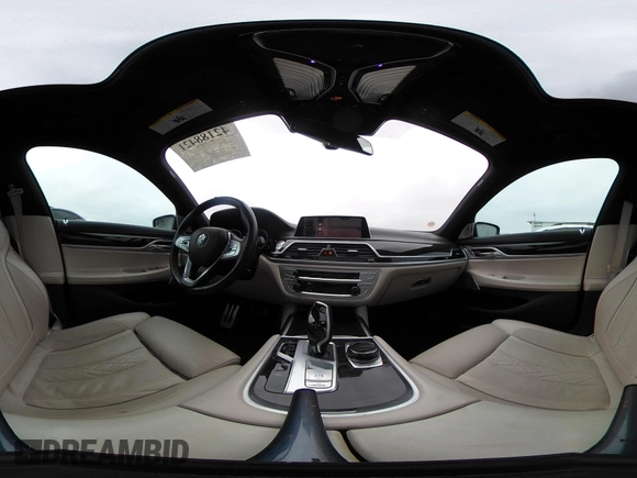 2019 BMW 7 Series 750i with VIN WBA7F0C50KGM26010, listed as a IAAI auction lot 42188421 with 71,576 mi miles and . Bid and sale history available at DreamBid. Image 19.