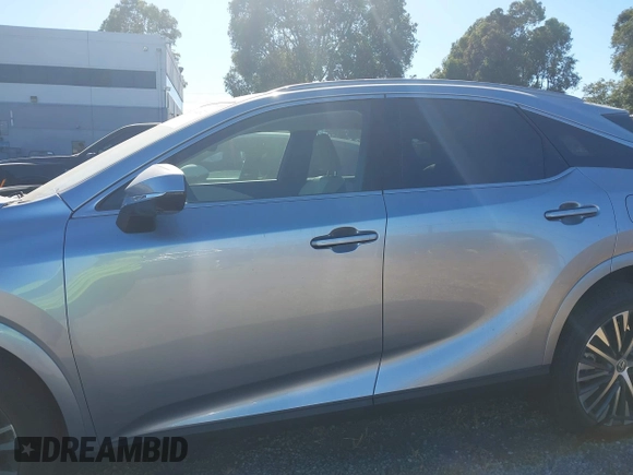 2025 Lexus RX 350h with VIN 2T2BBMCA8SC084121, listed as a IAAI auction lot 42644072 with 4,200 mi miles and . Bid and sale history available at DreamBid. Image 14.