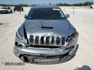 2016 Jeep Cherokee 75th Anniversary with VIN 1C4PJLCBXGW149100, listed as a Copart auction lot 52574015 with 96,308 mi miles and Salvage Title. Bid and sale history available at carsss.com. Image 5.