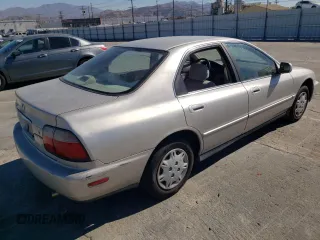 1996 Honda Accord Value with VIN 1HGCD5691TA249900, listed as a Copart auction lot 77683144 with 155,178 mi miles and Salvage Title. Bid and sale history available at DreamBid. Image 3.