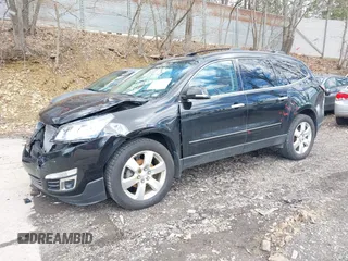 2017 Chevrolet Traverse Premier with VIN 1GNKVJKDXHJ148055, listed as a IAAI auction lot 41967000 with 116,265 mi miles and . Bid and sale history available at DreamBid. Image 2.