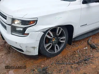 2018 Chevrolet Tahoe LT z VIN 1GNSKBKC9JR132670, wystawiony jako IAAI lot #42248273 z przebiegiem 136 636 mil mil oraz . Historia ofert i sprzedaży dostępna na DreamBid. Obrazek 6.