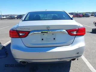 2016 Nissan Maxima SV z VIN 1N4AA6AP0GC905126, wystawiony jako IAAI lot #41849223 z przebiegiem 87 968 mil mil oraz . Historia ofert i sprzedaży dostępna na DreamBid. Obrazek 16.