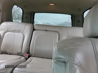 2002 Cadillac Escalade z VIN 1GYEK63N82R235118, wystawiony jako Copart lot #82691054 z przebiegiem 196 955 mil mil oraz Szkoda całkowita • Salvage title. Historia ofert i sprzedaży dostępna na DreamBid. Obrazek 10.