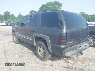 2002 Chevrolet Tahoe LS z VIN 1GNEC13ZX2R273935, wystawiony jako IAAI lot #42246472 z przebiegiem 205 995 mil mil oraz . Historia ofert i sprzedaży dostępna na DreamBid. Obrazek 3.