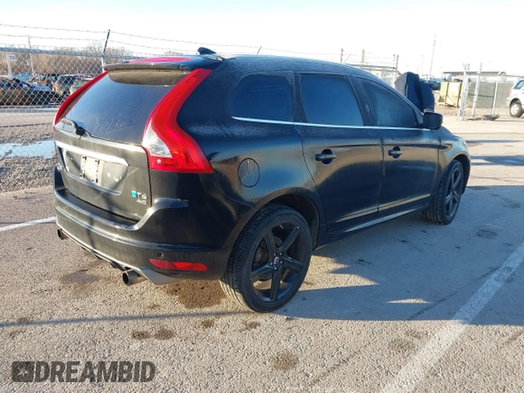 2014 Volvo XC60 R-Design Premier Plus z VIN YV4902DZ4E2537605, wystawiony jako IAAI lot #41126501 z przebiegiem 119 644 mil mil oraz . Historia ofert i sprzedaży dostępna na DreamBid. Obrazek 4.
