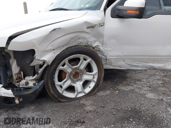2011 Ford F-150 Lariat with VIN 1FTFW1E63BFB80098, listed as a IAAI auction lot 42038087 with 243,992 mi miles. Bid and sale history available at carsss.com. Image 6.