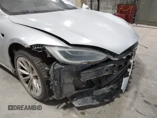 2017 Tesla Model S 100D with VIN 5YJSA1E23HF232059, listed as a IAAI auction lot 41394046 with 84,052 mi miles and . Bid and sale history available at DreamBid. Image 23.