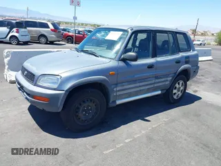 1996 Toyota RAV4 with VIN JT3GP10V2T7004322, listed as a IAAI auction lot 42774371 with 167,868 mi miles and . Bid and sale history available at DreamBid. Image 2.