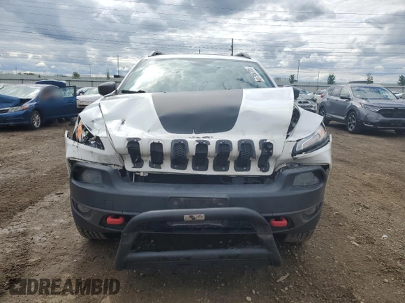 2016 Jeep Cherokee Trailhawk with VIN 1C4PJMBS8GW359461, listed as a Copart auction lot 57950705 with 146,124 mi miles and Salvage title. Bid and sale history available at DreamBid. Image 5.