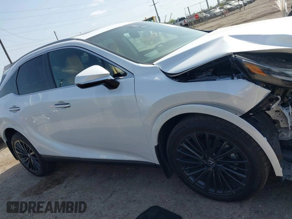 2024 Lexus RX 350 z VIN 2T2BAMBA8RC050498, wystawiony jako IAAI lot #41826928 z przebiegiem 1822 mil mil oraz . Historia ofert i sprzedaży dostępna na DreamBid. Obrazek 13.