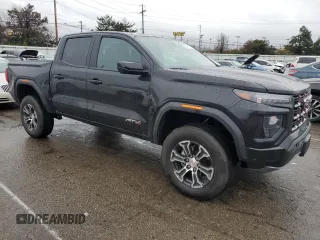 2023 GMC Canyon 4WD AT4 with VIN 1GTP6DEK6P1139567, listed as a Copart auction lot 85416794 with 26,583 mi miles and Salvage Title. Bid and sale history available at carsss.com. Image 4.