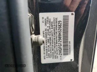 2009 Honda Civic Cpe EX-L with VIN 2HGFG12989H526829, listed as a Copart auction lot 73685054 with 169,968 mi miles and Salvage Title. Bid and sale history available at carsss.com. Image 13.