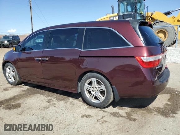 2012 Honda Odyssey Touring with VIN 5FNRL5H90CB076810, listed as a Copart auction lot 53124915 with 178,316 mi miles and Salvage Title. Bid and sale history available at DreamBid. Image 2.