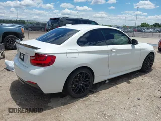 2014 BMW 2 Series 228i with VIN WBA1F5C54EV256303, listed as a IAAI auction lot 42214512 with 81,116 mi miles and . Bid and sale history available at DreamBid. Image 4.