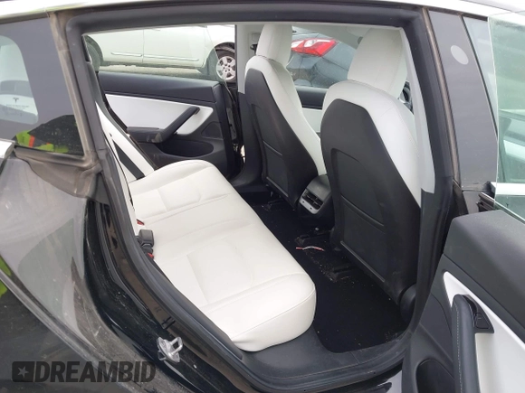 2018 Tesla Model 3 Long Range Battery with VIN 5YJ3E1EB9JF188437, listed as a IAAI auction lot 41371254 with 55,934 mi miles and . Bid and sale history available at DreamBid. Image 8.