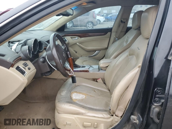 2009 Cadillac CTS RWD w/1SA with VIN 1G6DF577890122363, listed as a Copart auction lot 71401644 with 127,968 mi miles and Salvage Title. Bid and sale history available at carsss.com. Image 7.