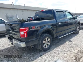 2018 Ford F-150 XL with VIN 1FTEW1E51JFC19191, listed as a IAAI auction lot 41919055 with 87,367 mi miles. Bid and sale history available at carsss.com. Image 4.