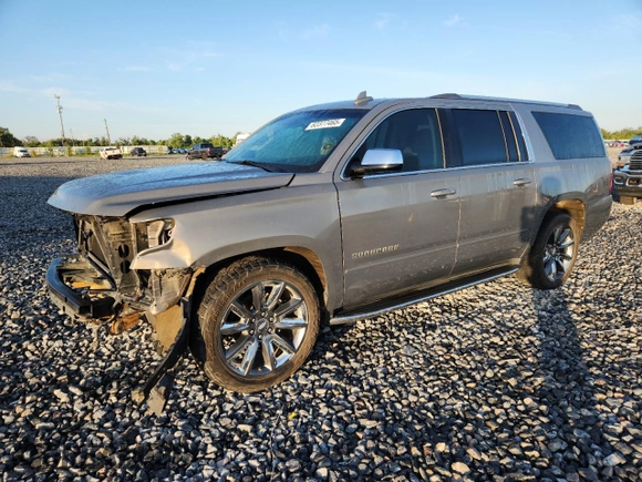 2019 Chevrolet Suburban LT with VIN 1GNSCJKC3KR129739, listed as a Copart auction lot 62377465 with 105,771 mi miles and Salvage title. Bid and sale history available at DreamBid. Image 1.