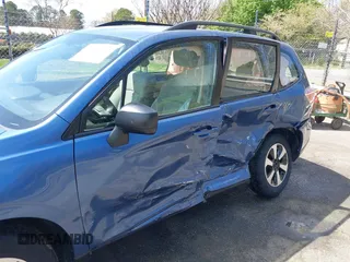 2018 Subaru Forester z VIN JF2SJABC9JH525596, wystawiony jako IAAI lot #41941424 z przebiegiem 32 622 mil mil oraz . Historia ofert i sprzedaży dostępna na DreamBid. Obrazek 17.
