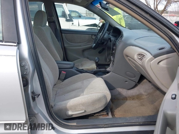 2004 Oldsmobile Alero GX z VIN 1G3NK52F44C148462, wystawiony jako IAAI lot #41804479 z przebiegiem 206 745 mil mil oraz . Historia ofert i sprzedaży dostępna na DreamBid. Obrazek 5.