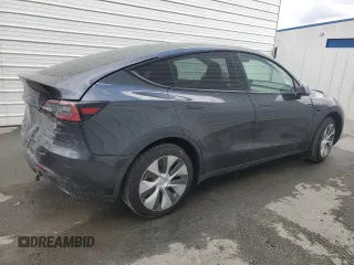 2024 Tesla Model Y with VIN 7SAYGDED4RF017614, listed as a Copart auction lot 45754675 with 11,209 mi miles and Salvage title. Bid and sale history available at DreamBid. Image 3.