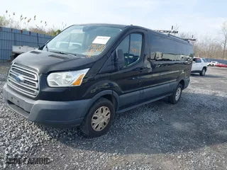 2016 Ford Transit Wagon XL with VIN 1FBZX2ZM2GKA65763, listed as a IAAI auction lot 41912092 with 208,401 mi miles. Bid and sale history available at carsss.com. Image 17.