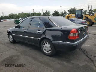 1996 Mercedes-Benz C z VIN WDBHA28E5TF452117, wystawiony jako Copart lot #64761835 z przebiegiem 174 778 mil mil oraz Nie do naprawy • Non repairable. Historia ofert i sprzedaży dostępna na DreamBid. Obrazek 2.