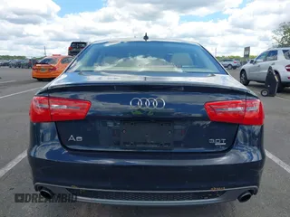 2013 Audi A6 Prestige z VIN WAUJGAFC6DN005023, wystawiony jako IAAI lot #42201985 z przebiegiem 80 337 mil mil oraz . Historia ofert i sprzedaży dostępna na DreamBid. Obrazek 16.