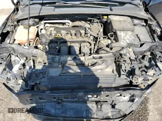 2016 Ford Focus SE z VIN 1FADP3F2XGL261707, wystawiony jako Copart lot #59078565 z przebiegiem 79 820 mil mil oraz Szkoda całkowita • Salvage title. Historia ofert i sprzedaży dostępna na DreamBid. Obrazek 11.