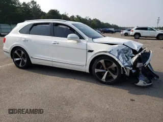 2019 Bentley Bentayga V8 z VIN SJAAM2ZV4KC026896, wystawiony jako Copart lot #57332313 z przebiegiem Nie podano mil oraz . Historia ofert i sprzedaży dostępna na DreamBid. Obrazek 4.