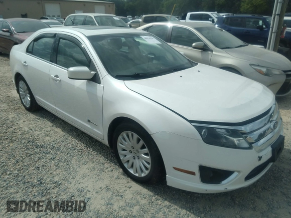 2010 Ford Fusion Hybrid z VIN 3FADP0L31AR387443, wystawiony jako IAAI lot #40034145 z przebiegiem 153 847 mil mil oraz . Historia ofert i sprzedaży dostępna na DreamBid. Obrazek 1.