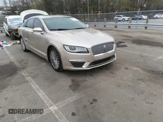 2017 Lincoln MKZ Reserve z VIN 3LN6L5E94HR615115, wystawiony jako IAAI lot #41947698 z przebiegiem 122 090 mil mil oraz . Historia ofert i sprzedaży dostępna na DreamBid. Obrazek 1.