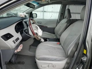 2011 Toyota Sienna XLE AAS with VIN 5TDYK3DC9BS120799, listed as a Copart auction lot 61470045 with 194,422 mi miles and Salvage title. Bid and sale history available at DreamBid. Image 7.