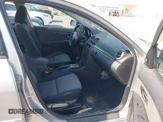 2006 Mazda Mazda3 i with VIN JM1BK12G861534885, listed as a IAAI auction lot 39860656 with 203,722 mi miles. Bid and sale history available at carsss.com. Image 5.