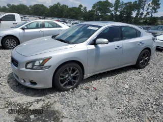 2012 Nissan Maxima SV with VIN 1N4AA5AP4CC849843, listed as a Copart auction lot 61877515 with 245,338 mi miles and Salvage title. Bid and sale history available at DreamBid. Image 1.