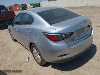 2017 Toyota Yaris iA with VIN 3MYDLBYV2HY161909, listed as a IAAI auction lot 41984206 with 128,898 mi miles. Bid and sale history available at carsss.com. Image 3.