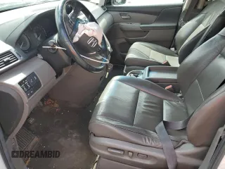 2012 Honda Odyssey Touring z VIN 5FNRL5H93CB070824, wystawiony jako Copart lot #49213465 z przebiegiem 287 745 mil mil oraz Szkoda całkowita • Salvage title. Historia ofert i sprzedaży dostępna na DreamBid. Obrazek 7.