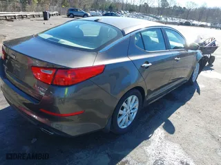 2014 Kia Optima EX with VIN 5XXGN4A78EG320367, listed as a IAAI auction lot 41858824 with 216,987 mi miles. Bid and sale history available at carsss.com. Image 4.