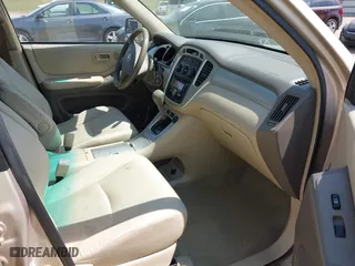 2006 Toyota Highlander Hybrid with VIN JTEDW21A460001983, listed as a IAAI auction lot 41919095 with 303,345 mi miles. Bid and sale history available at carsss.com. Image 5.