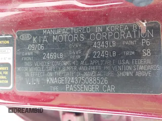 2007 Kia Optima EX with VIN KNAGE124375088526, listed as a IAAI auction lot 41526854 with 285,908 mi miles. Bid and sale history available at carsss.com. Image 9.