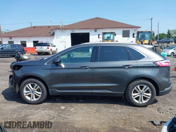 2019 Ford Edge SEL with VIN 2FMPK4J94KBB45522, listed as a IAAI auction lot 42462801 with 56,289 mi miles and . Bid and sale history available at DreamBid. Image 14.