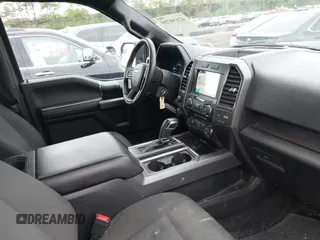 2018 Ford F-150 XL with VIN 1FTEW1EPXJFC85210, listed as a IAAI auction lot 42150759 with 97,660 mi miles and . Bid and sale history available at carsss.com. Image 5.