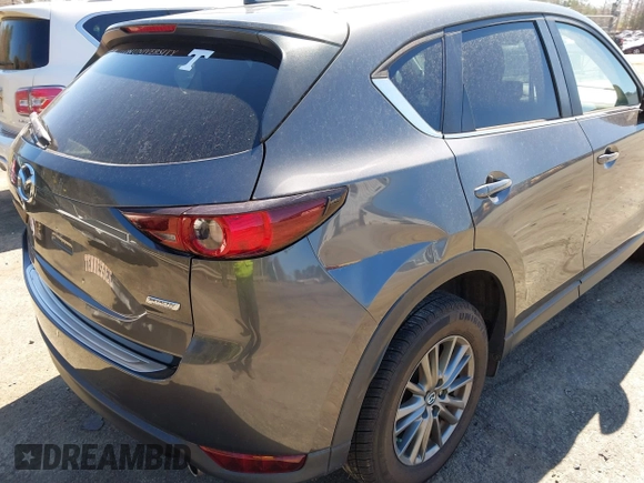 2017 Mazda CX-5 Touring with VIN JM3KFBCL2H0203497, listed as a IAAI auction lot 41860782 with 65,482 mi miles. Bid and sale history available at carsss.com. Image 6.