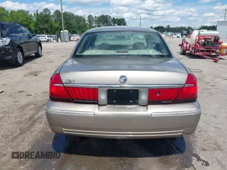 2001 Mercury Grand Marquis LS z VIN 2MEFM75W31X704182, wystawiony jako IAAI lot #42086175 z przebiegiem 177 892 mil mil oraz . Historia ofert i sprzedaży dostępna na DreamBid. Obrazek 16.