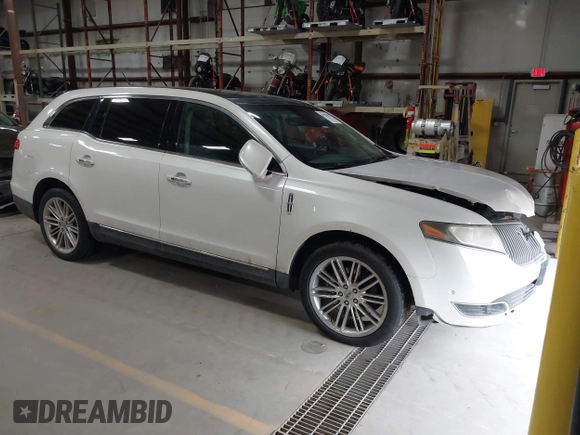 2013 Lincoln MKT EcoBoost with VIN 2LMHJ5AT3DBL56954, listed as a IAAI auction lot 41705877 with 148,771 mi miles. Bid and sale history available at carsss.com. Image 1.