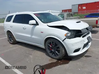 2018 Dodge Durango SRT z VIN 1C4SDJGJ2JC434843, wystawiony jako IAAI lot #42434327 z przebiegiem 144 483 mil mil oraz . Historia ofert i sprzedaży dostępna na DreamBid. Obrazek 1.