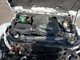 2012 Jeep Wrangler Unlimited Altitude with VIN 1C4HJWEG4CL285314, listed as a Copart auction lot 54494955 with 137,011 mi miles and Salvage title. Bid and sale history available at DreamBid. Image 11.
